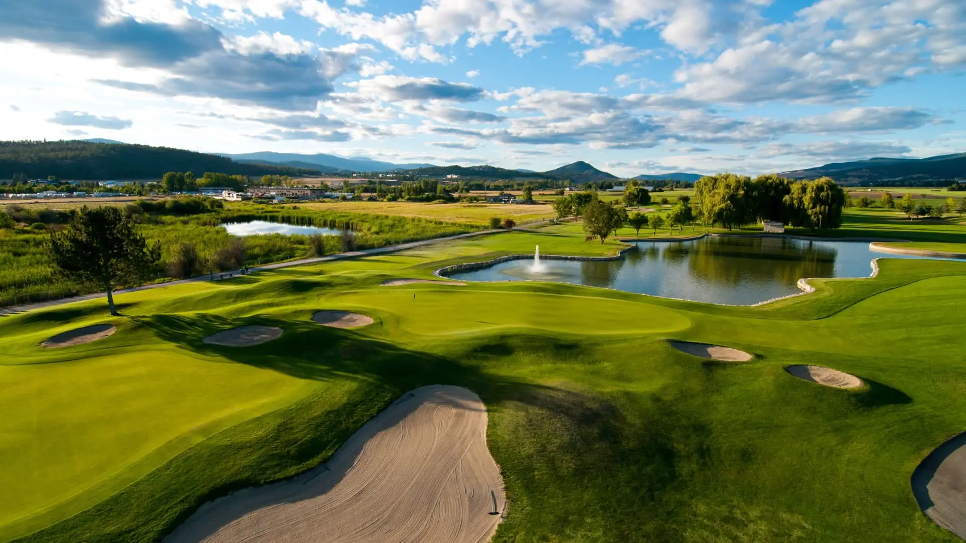 Kelowna_Springs_Hole_17_Green_Clouds_2012-2